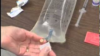 IV Therapy Adding Medication to IV Solution Bag [upl. by Ebba239]