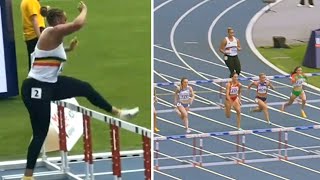 Belgian shot putter goes viral running hurdles to save team from disqualification [upl. by Llehsam]