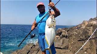 SJ On the rocks with a Bad Ass White Trevally and ZENAQ MUTHOS Sonio 100M [upl. by Ash]