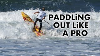 How to Paddle Out in Bigger Surf on a SUP [upl. by Gnoh51]