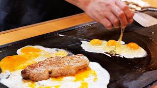 Japanese Food  The BEST PORK CHOP OMELETTE in Osaka Okonomiyaki Dontaku Japan [upl. by Siuqaj]