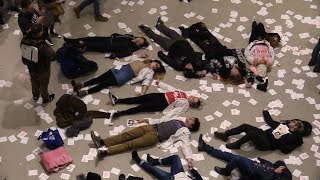 Brian Ross Investigates — Protestors stage a “Die In” at the Guggenheim Museum in New York [upl. by Aynor]