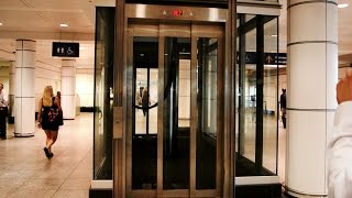 Epic Priceless amp Amazing inground hydraulic glass elevators  Montreal Trudeau Airport YUL [upl. by Niatirb]