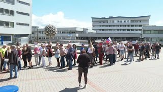 Supporters of Slovakian PM Fico gather at hospital where he is being treated  AFP [upl. by Monahan]